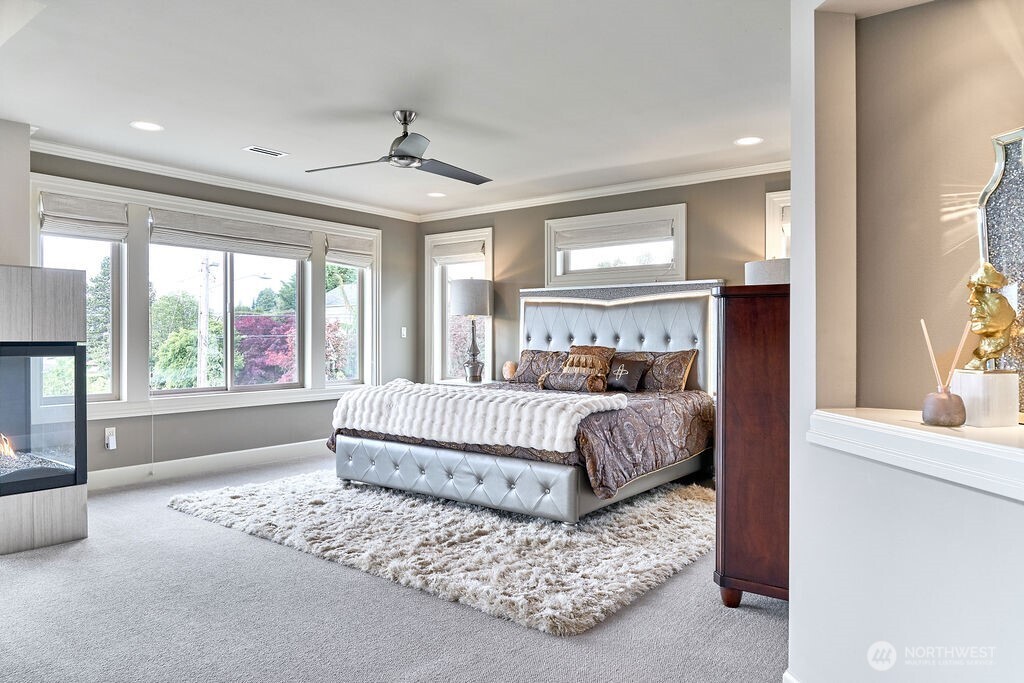 3319 Burnett Avenue North Renton, WA 98056 - Photo 31 of 40 a bedroom with a large bed and a window