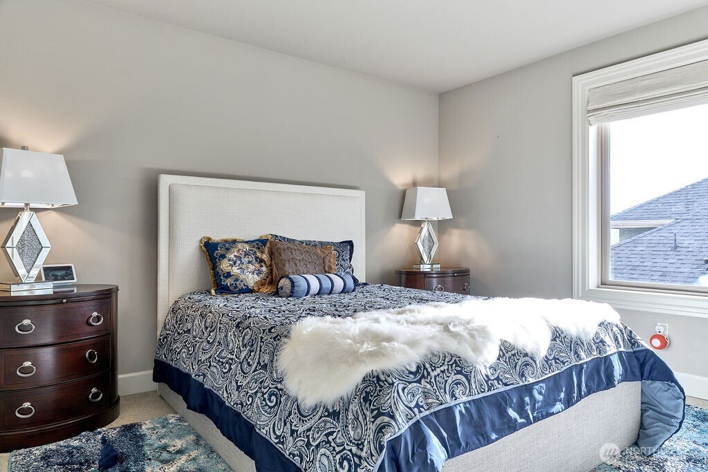 3319 Burnett Avenue North Renton, WA 98056 - Photo 36 of 40 a bedroom with a bed and a window