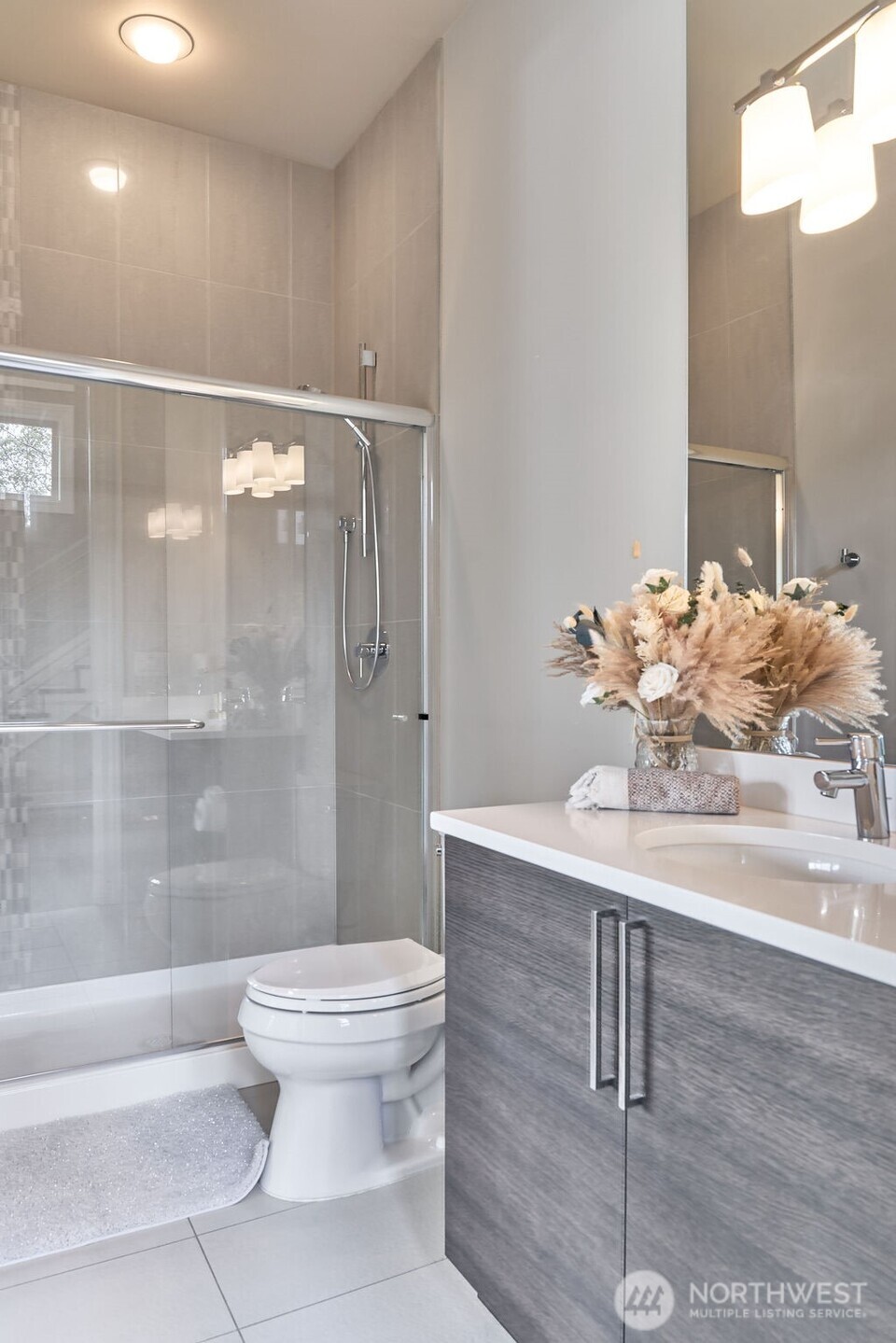 3319 Burnett Avenue North Renton, WA 98056 - Photo 8 of 40 a bathroom with a sink toilet and shower