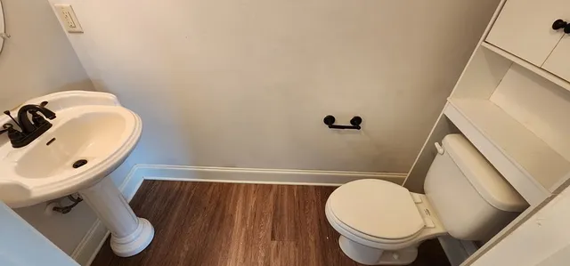 a bathroom with a toilet and a sink