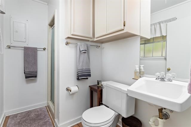 1535 Infinity Lane Beaumont, TX 77706 - Photo 16 of 35 a bathroom with a sink a toilet and shower