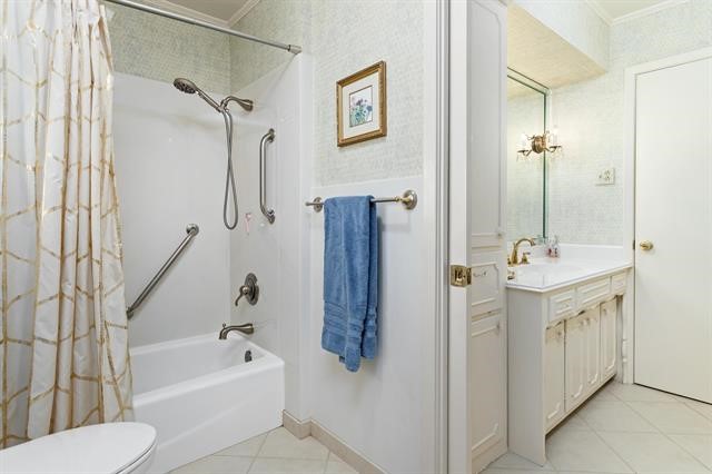 1535 Infinity Lane Beaumont, TX 77706 - Photo 19 of 35 a bathroom with a sink a toilet and shower