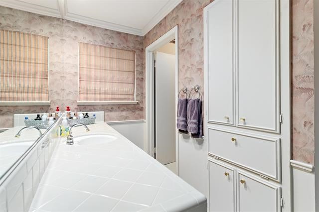 1535 Infinity Lane Beaumont, TX 77706 - Photo 24 of 35 a spacious bathroom with a bathtub sink and vanity