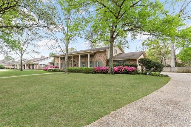 1535 Infinity Lane Beaumont, TX 77706 - Photo 4 of 35 a front view of house with yard and trees