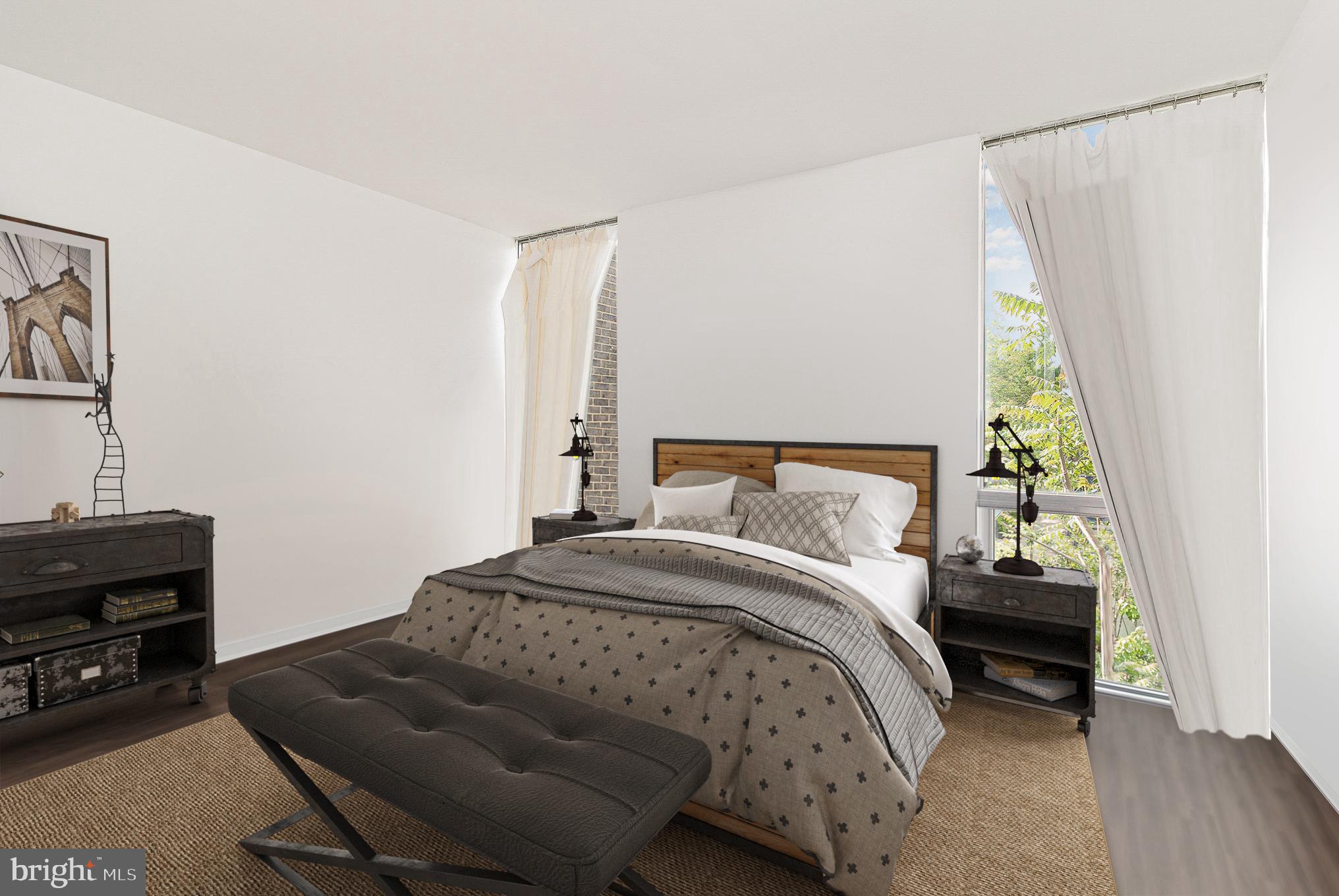 1338 4th Street Southwest, Unit T1338 Washington, DC 20024 - Photo 12 of 24 a bedroom with a bed and a window