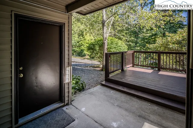 a view of wooden deck with a bench