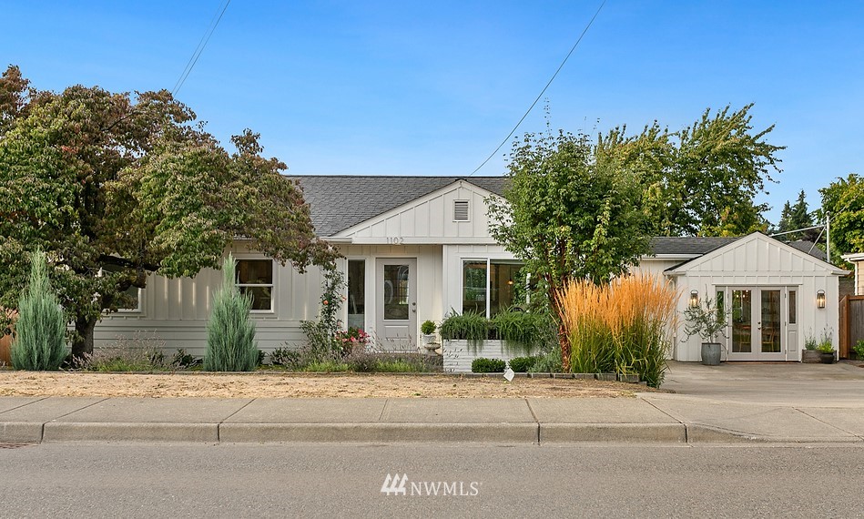 1102 North 30th Street Renton, WA 98056 - Photo 1 of 38 front view of a house with a yard