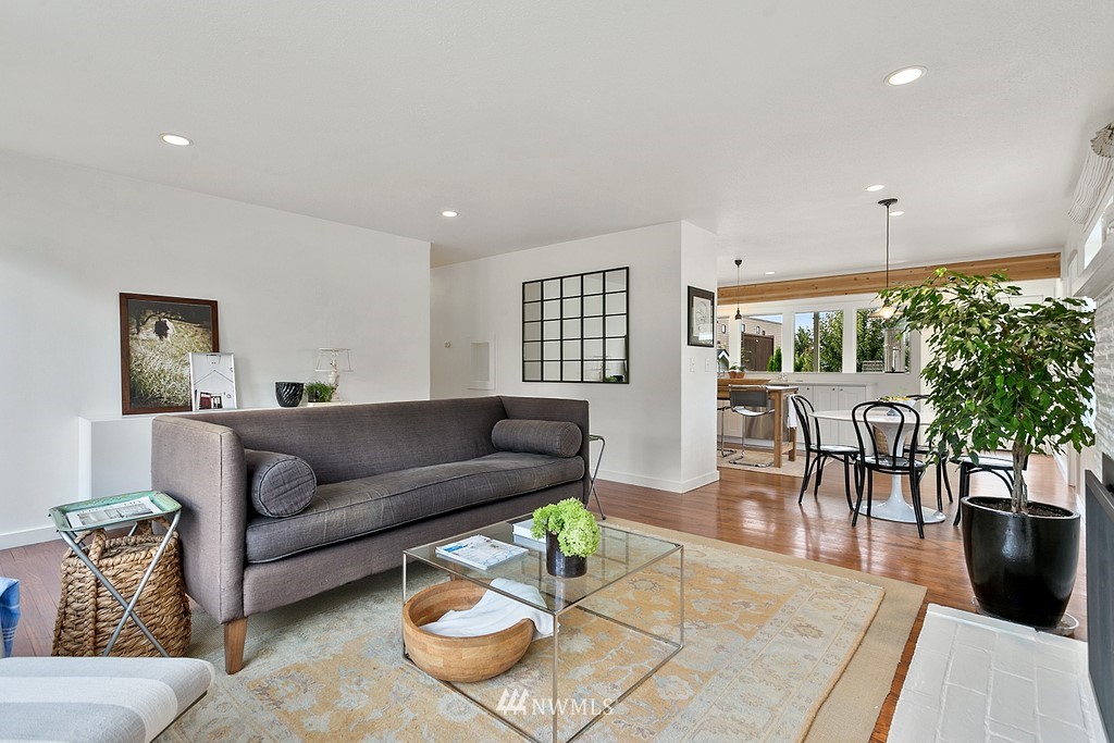 1102 North 30th Street Renton, WA 98056 - Photo 17 of 38 a living room with furniture potted plant and a large window