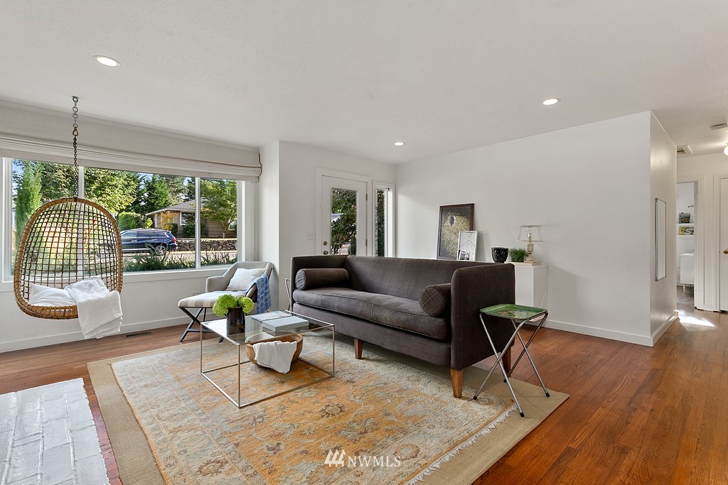 1102 North 30th Street Renton, WA 98056 - Photo 19 of 38 a living room with furniture and a wooden floor