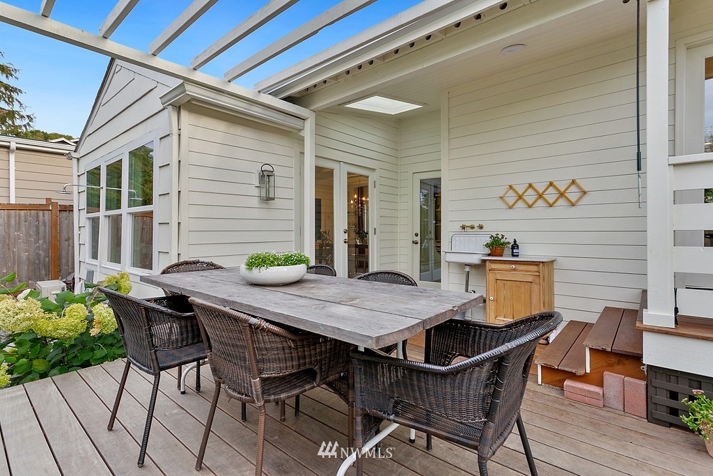 1102 North 30th Street Renton, WA 98056 - Photo 29 of 38 a view of a table and chairs in patio of the house