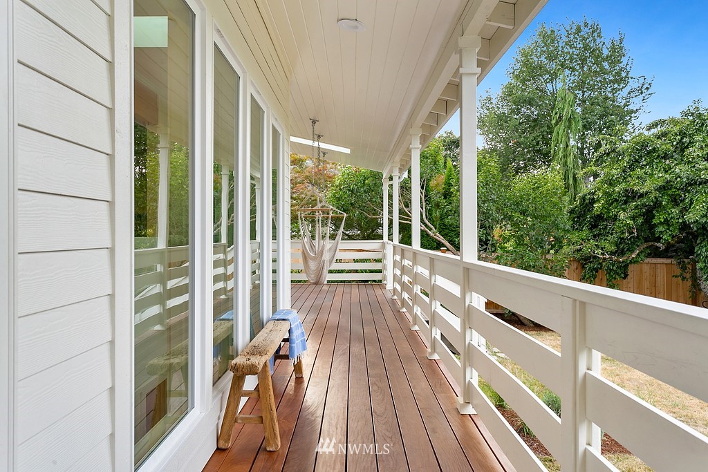 1102 North 30th Street Renton, WA 98056 - Photo 31 of 38 a view of balcony with wooden floor and outdoor space