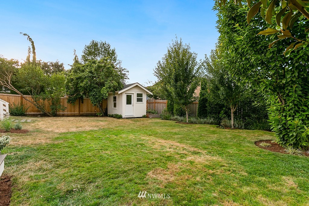 1102 North 30th Street Renton, WA 98056 - Photo 36 of 38 a view of a house with backyard and garden