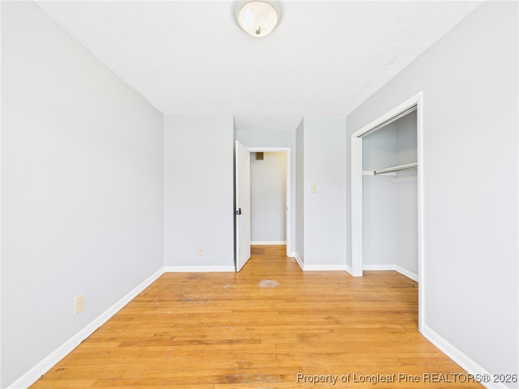1540 Mack Street Spring Lake, NC 28390 - Photo 19 of 31 a view of a room with wooden floor