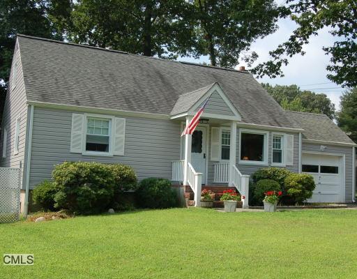 17 Powder Horn Road Norwalk, CT 06850 - Photo 1 of 1 a view of house with garden and tall trees