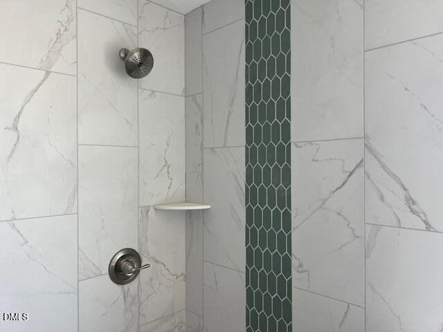 169 Big Pine Road Clayton, NC 27520 - Photo 9 of 14 a bathroom with a shower