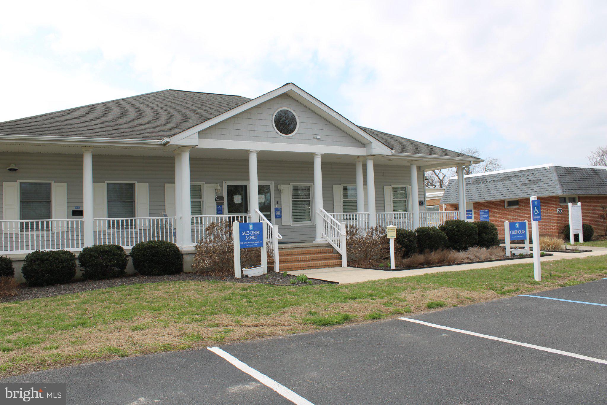 7 Colonial Lane Rehoboth Beach, DE 19971 - Photo 15 of 18 Charming community center with porch.