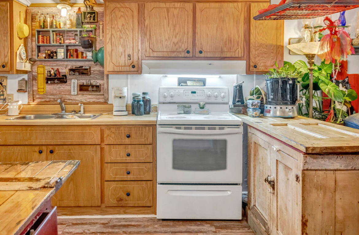 4360 Rebecca Road Crestview, FL 32539 - Photo 25 of 30 a kitchen with a stove and a sink