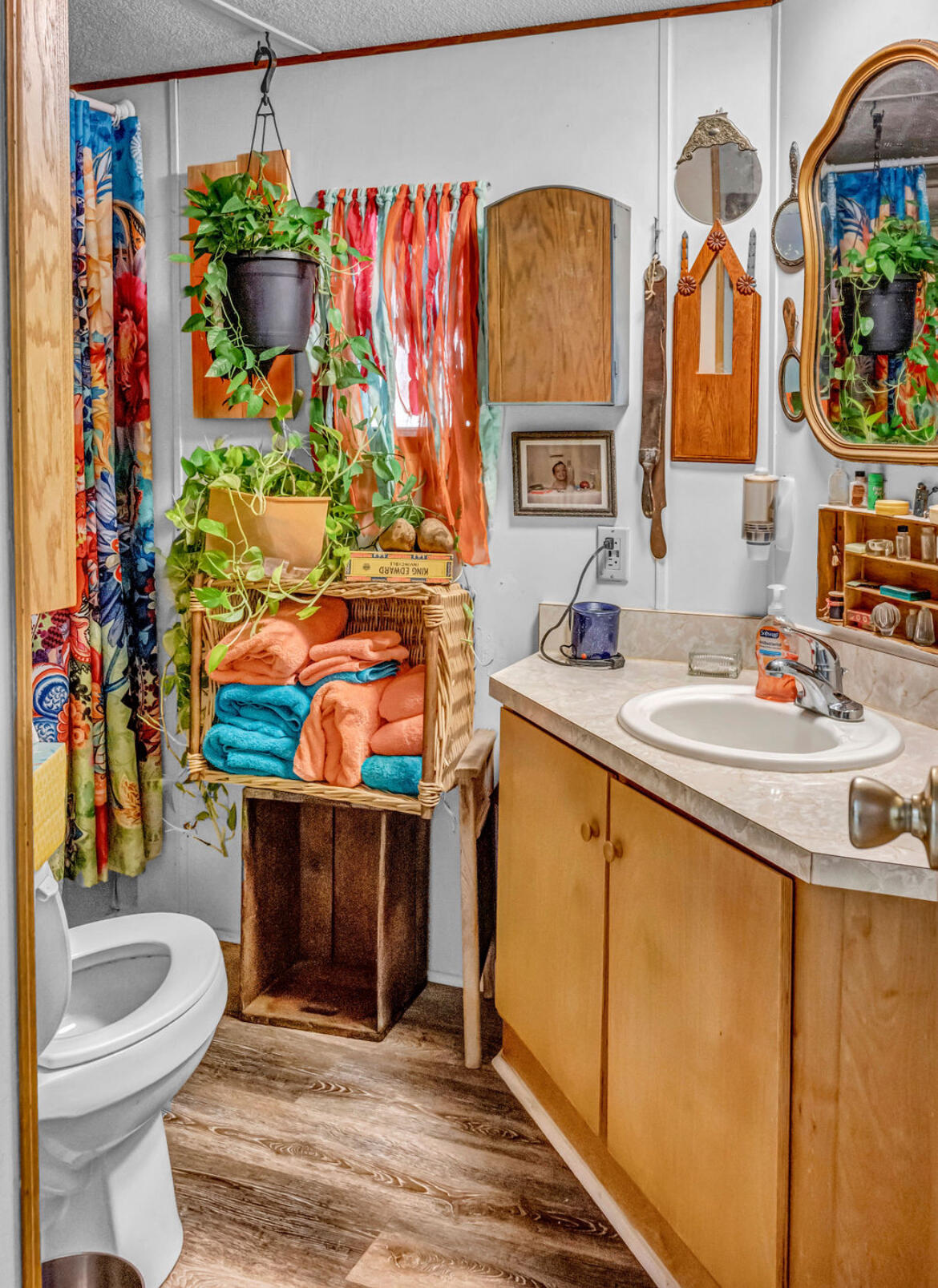 4360 Rebecca Road Crestview, FL 32539 - Photo 29 of 30 a bathroom with a sink toilet and mirror