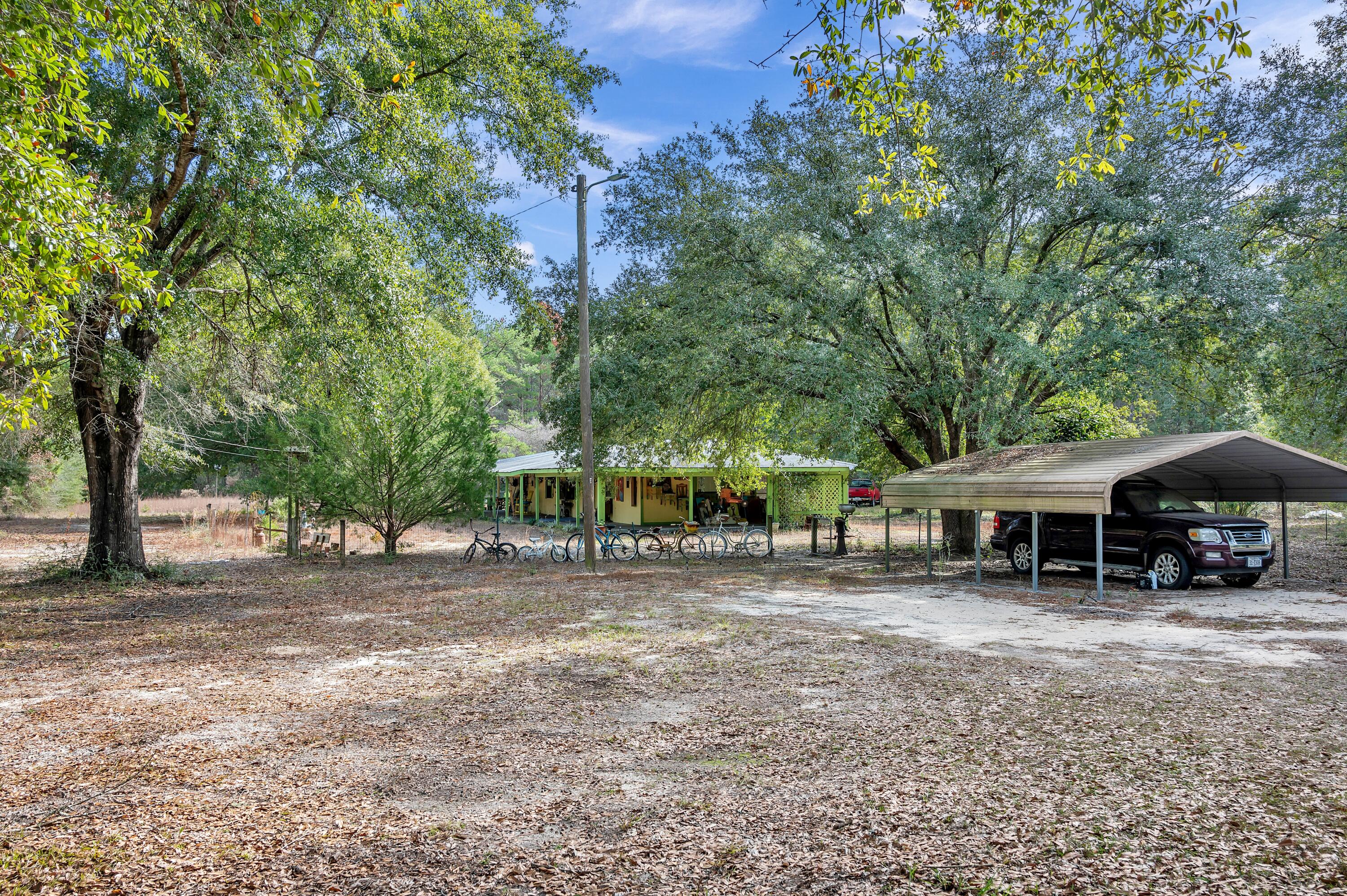 4360 Rebecca Road Crestview, FL 32539 - Photo 5 of 30 a view of a outdoor space with a patio