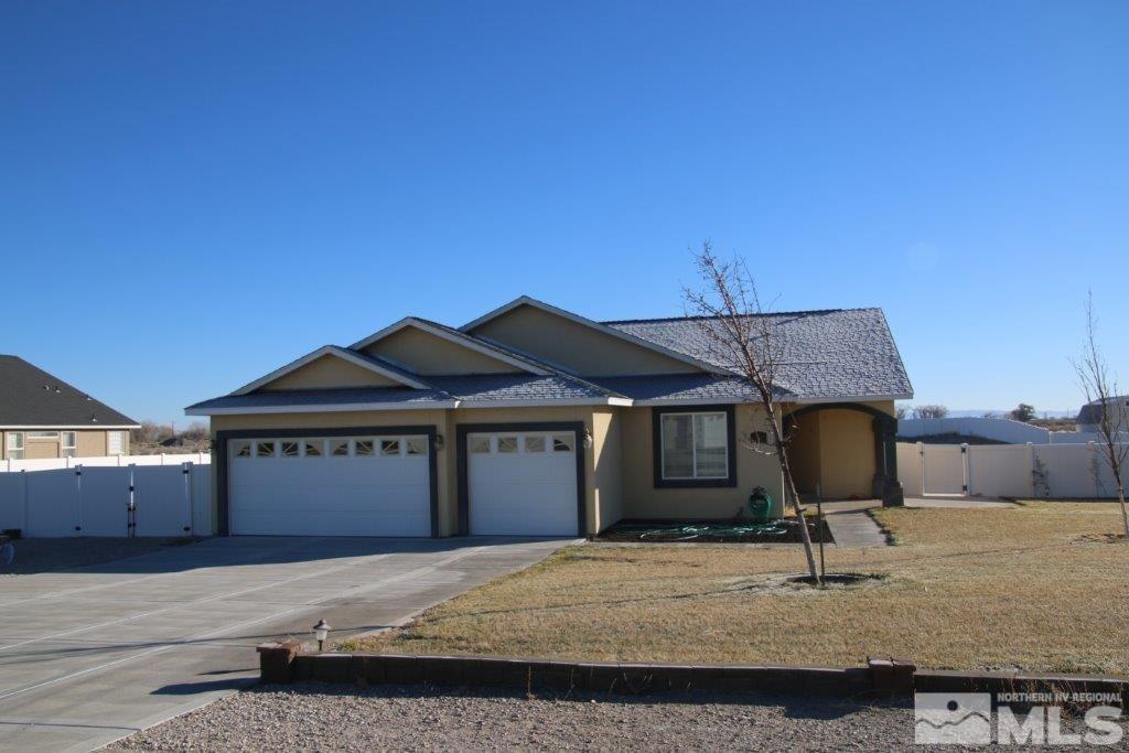 1910 Heidi Road Fallon, NV 89406 - Photo 1 of 1 a house with yard in front of it