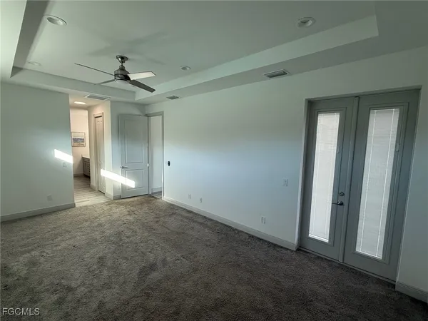 a bathroom with a double vanity sink and mirror