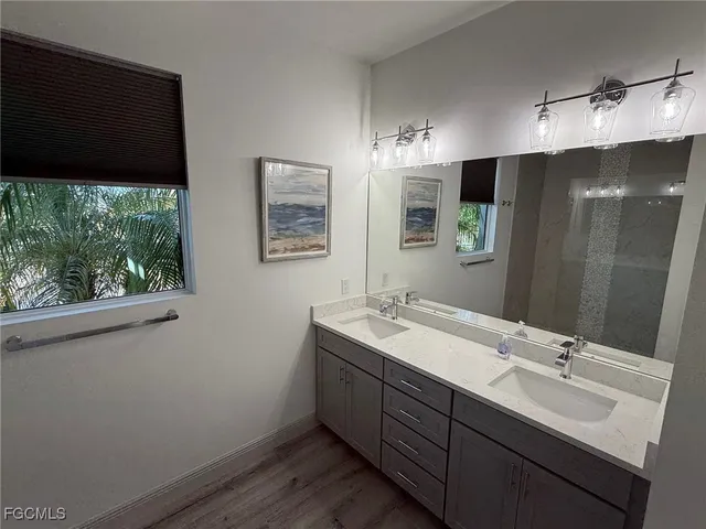 a bathroom with a shower and a toilet