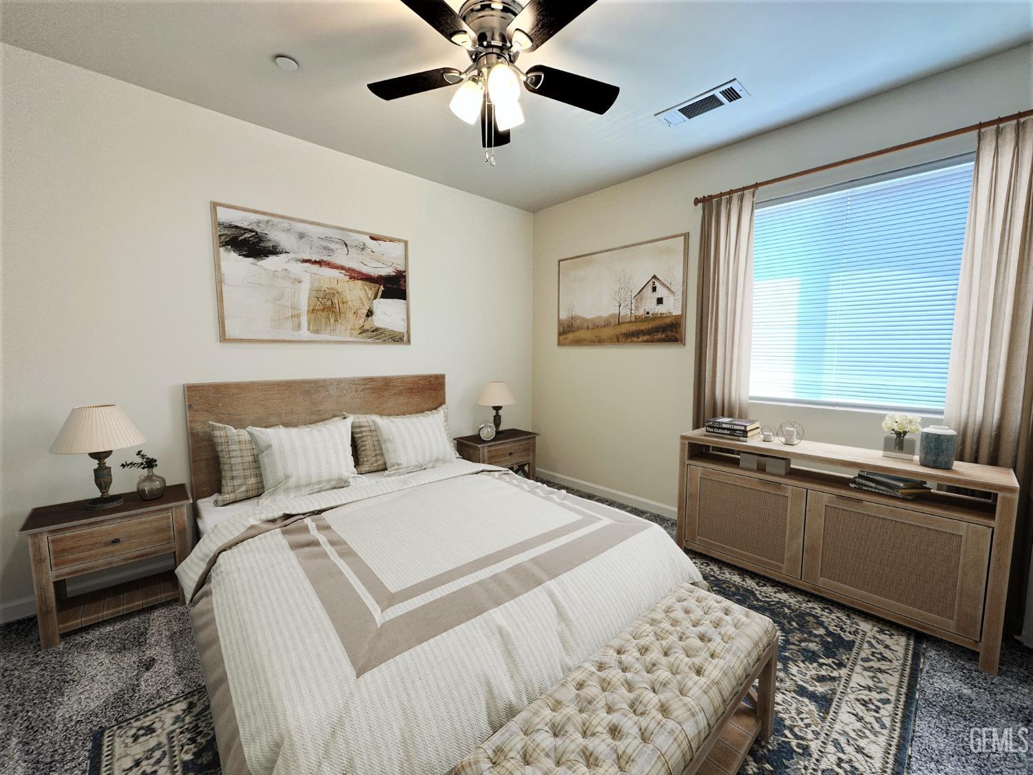 Undisclosed Address Bakersfield, CA 93307 - Photo 6 of 10 a bedroom with a bed and a chandelier