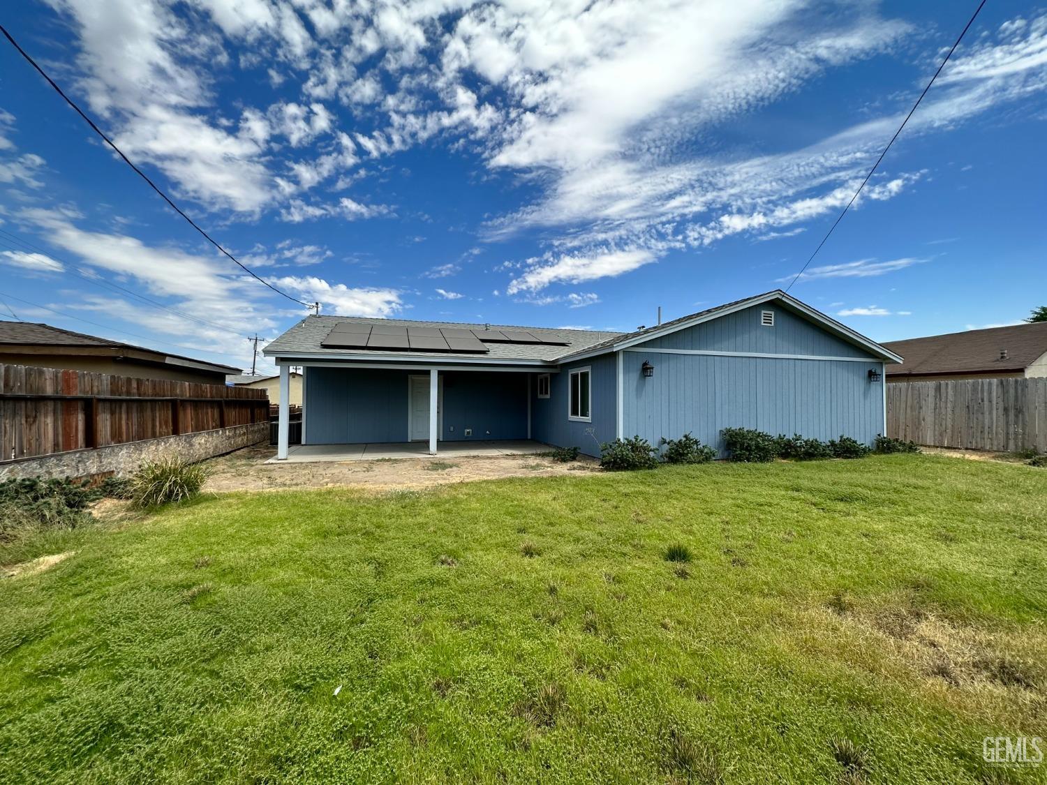 Undisclosed Address Bakersfield, CA 93307 - Photo 10 of 10 a house view with a backyard space