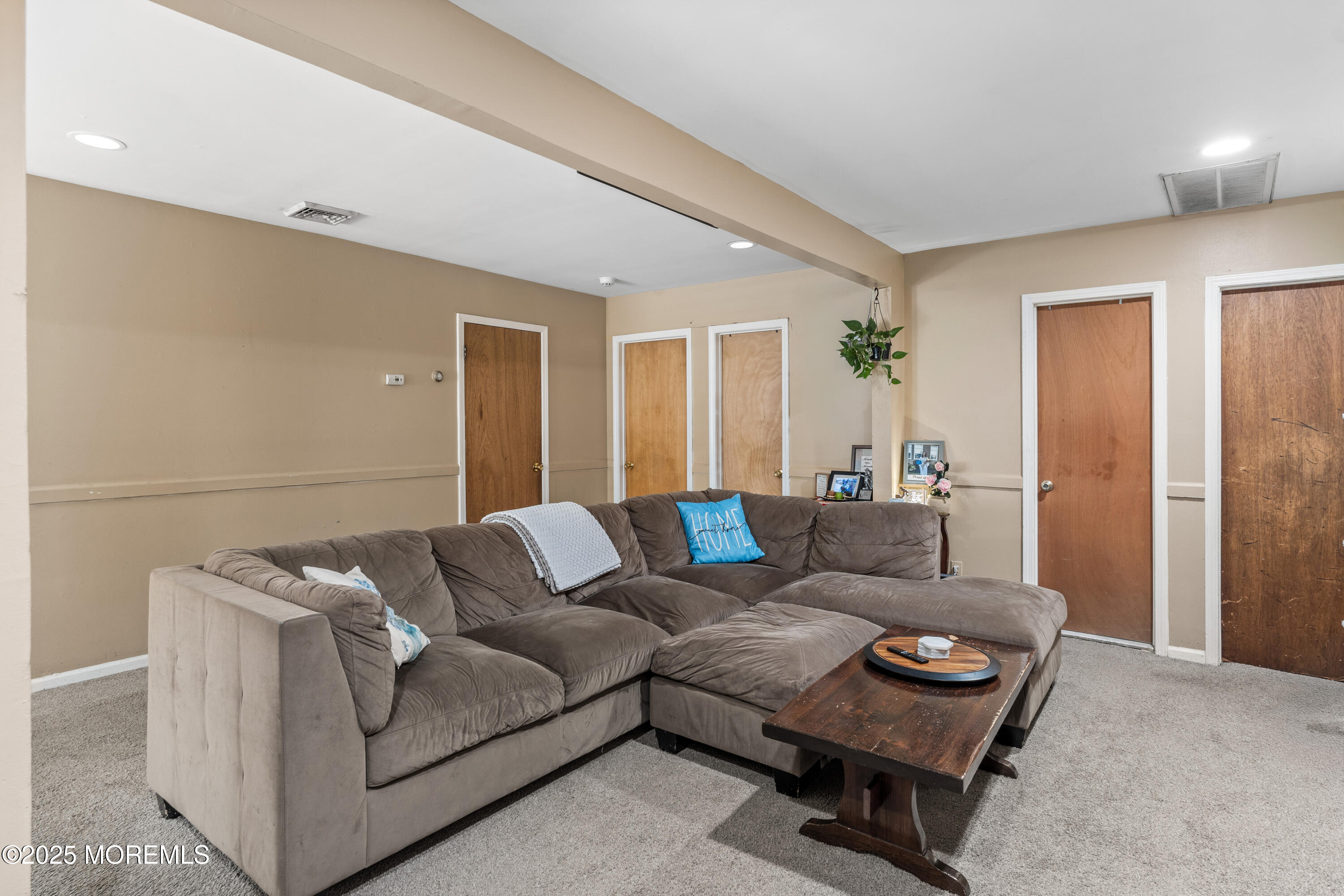 517 14th Avenue Belmar, NJ 07719 - Photo 15 of 31 a living room with furniture and a rug