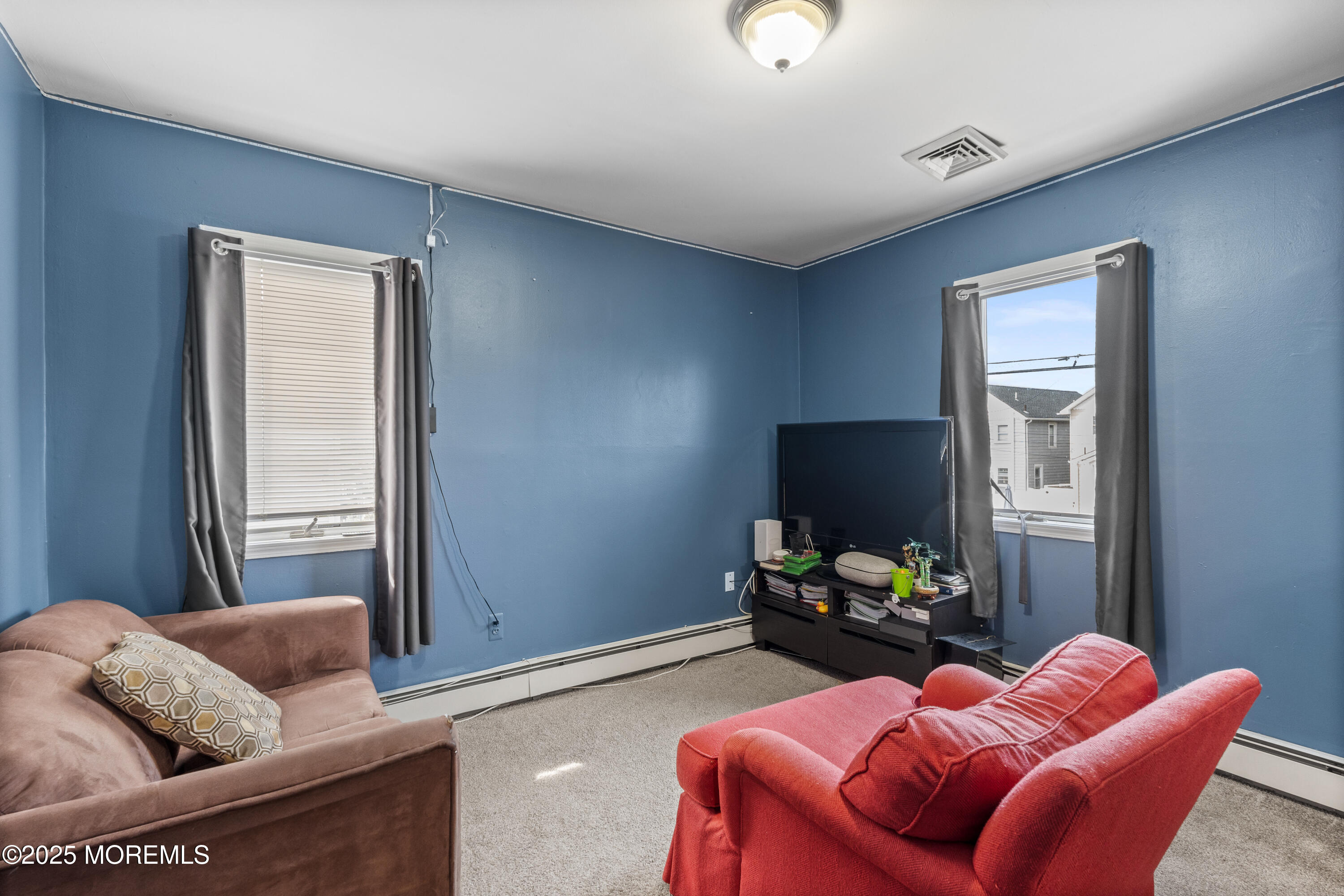 517 14th Avenue Belmar, NJ 07719 - Photo 18 of 31 a living room with furniture and a window