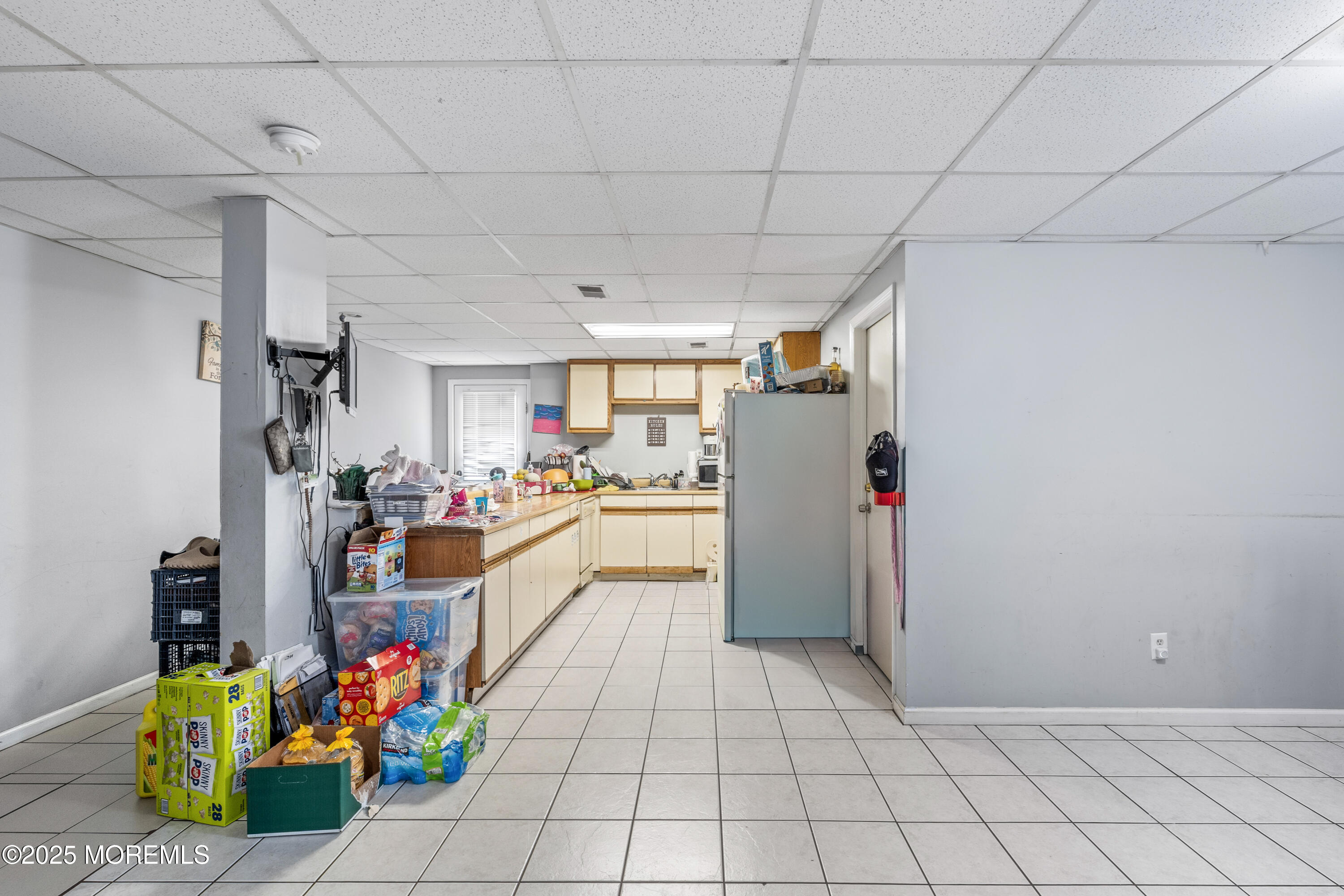 517 14th Avenue Belmar, NJ 07719 - Photo 24 of 31 a view of kitchen with furniture and refrigerator