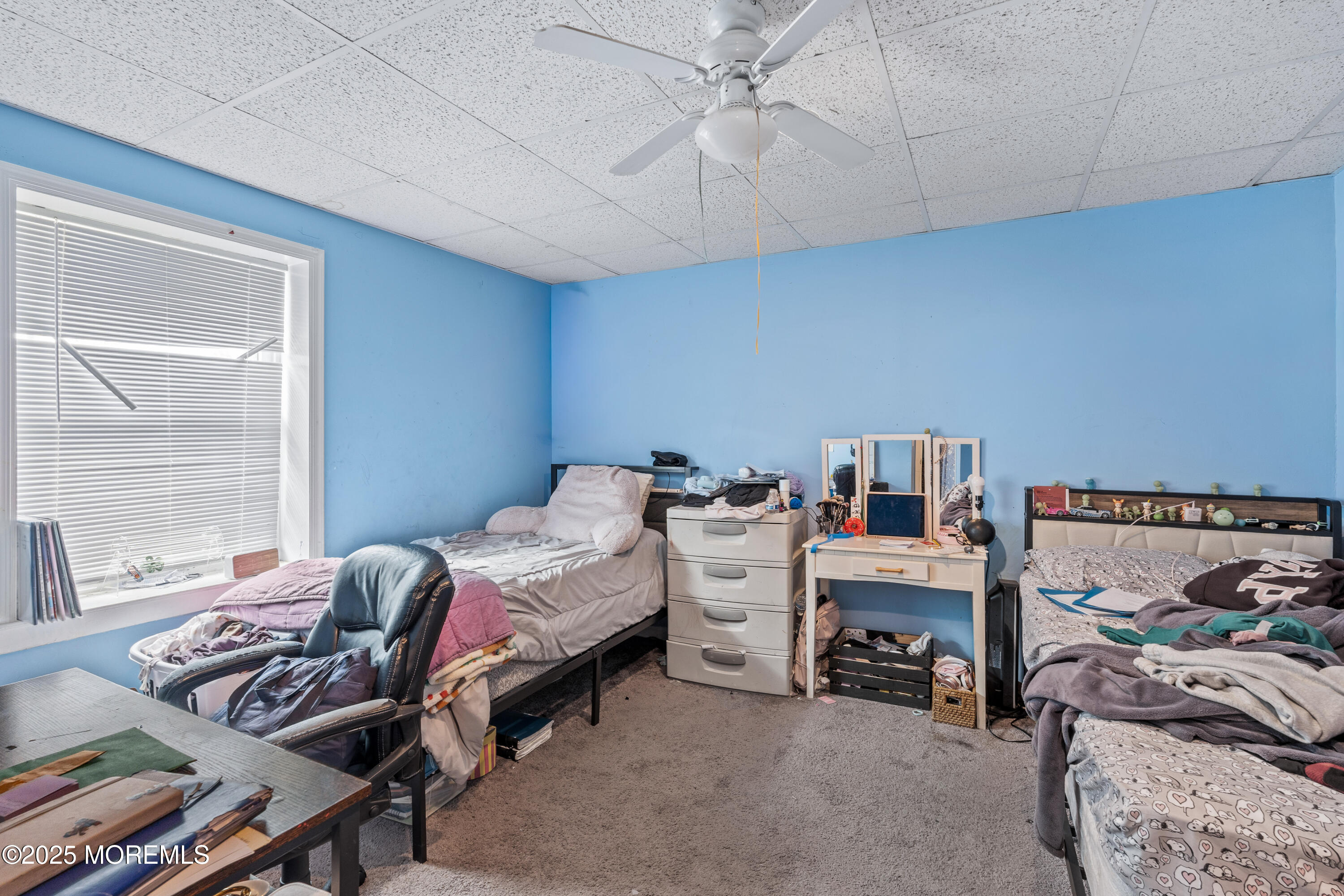 517 14th Avenue Belmar, NJ 07719 - Photo 27 of 31 a bedroom with furniture and a window