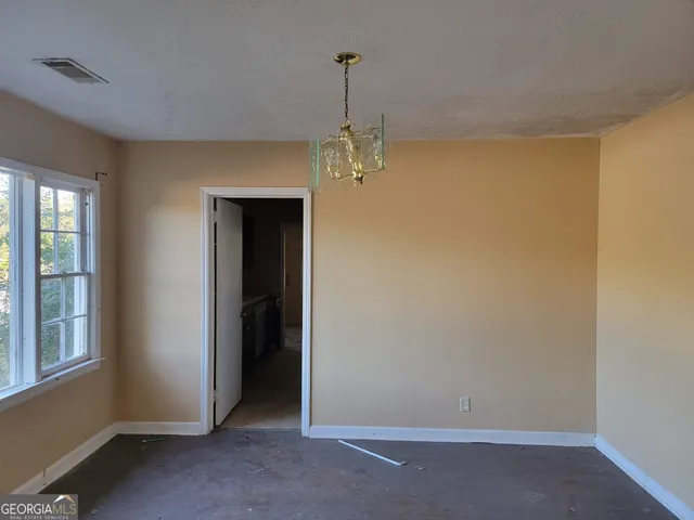 an empty room with windows