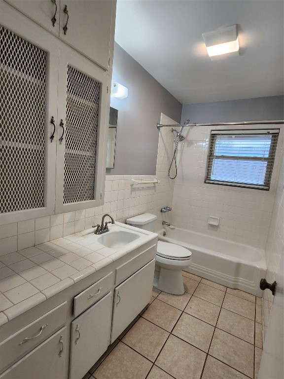 1912 Ridgemont Drive Austin, TX 78723 - Photo 19 of 28 a bathroom with a sink a toilet and shower
