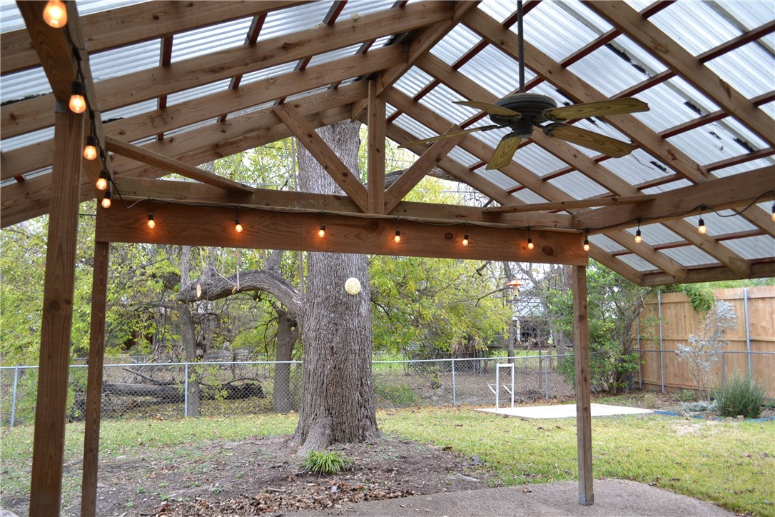 1912 Ridgemont Drive Austin, TX 78723 - Photo 26 of 28 a backyard of a house with a garden view