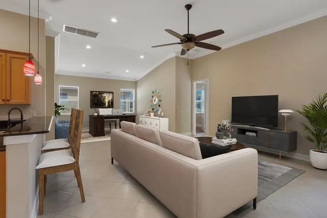 a living room with furniture and a table