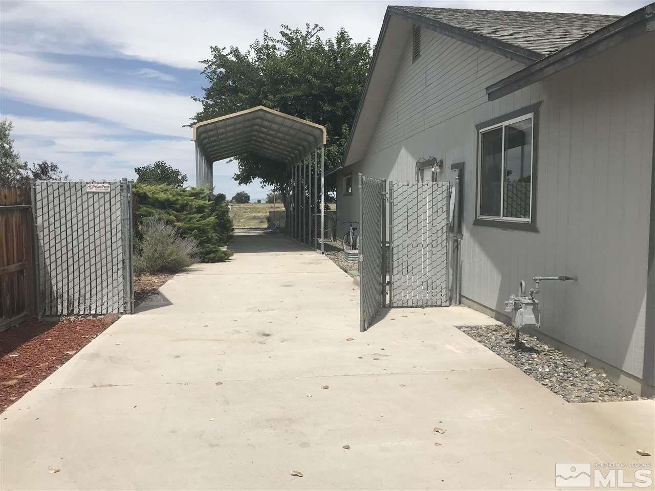 1820 Rice Road Fallon, NV 89406 - Photo 3 of 17 a view of a backyard of the house