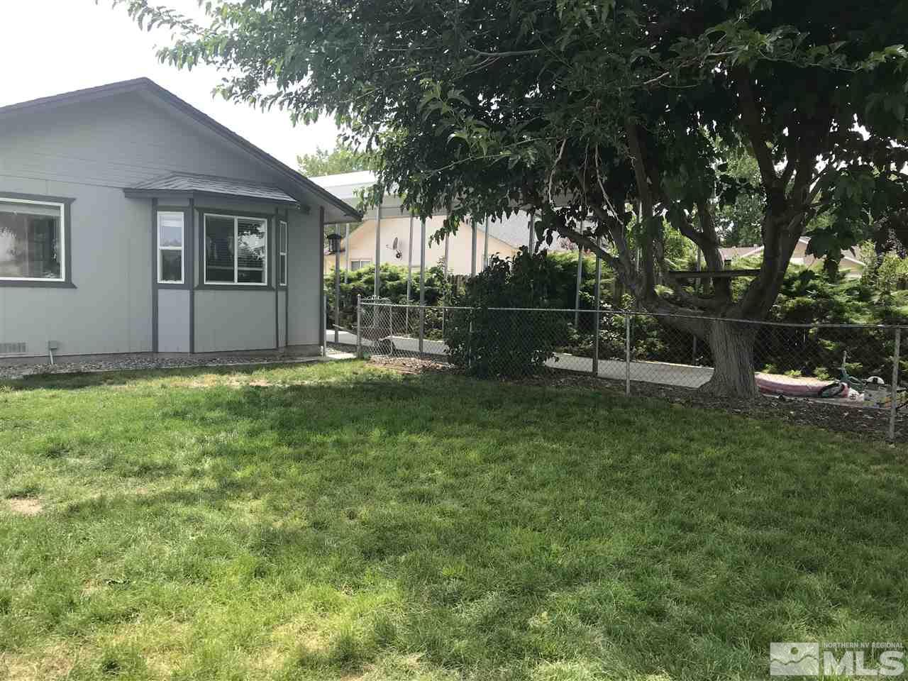 1820 Rice Road Fallon, NV 89406 - Photo 6 of 17 a view of a house with backyard and sitting area