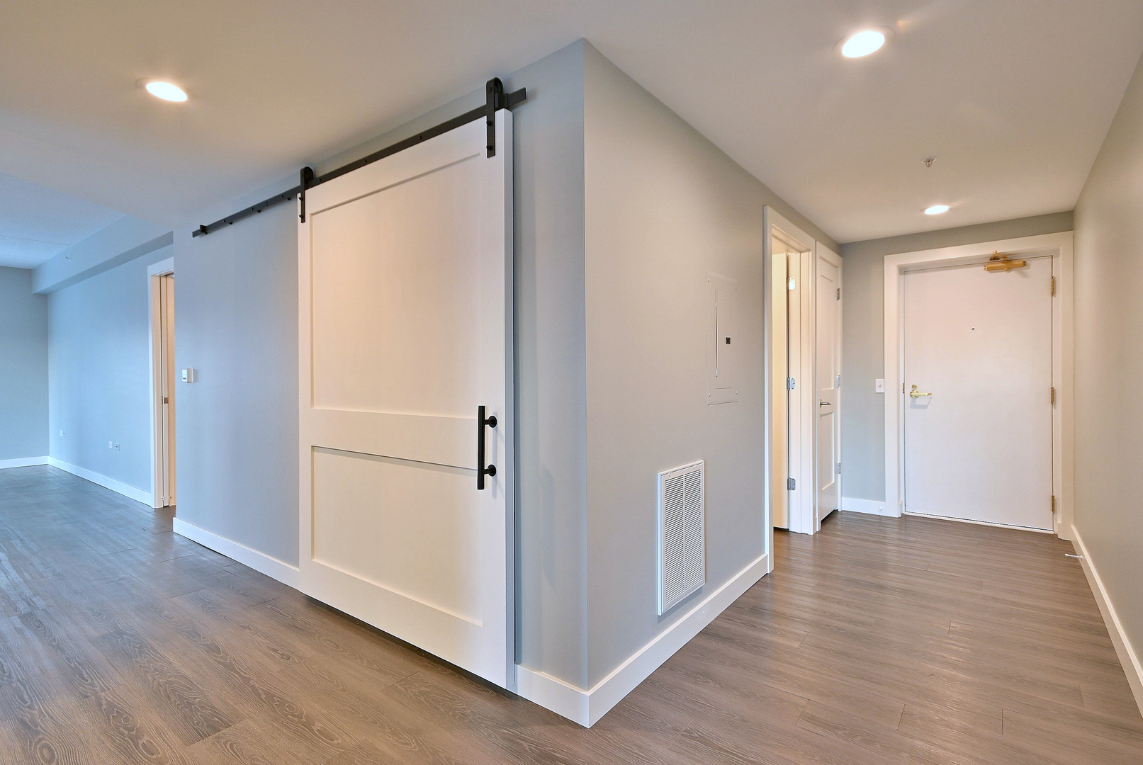 210 North Addison Avenue, Unit 303 Elmhurst, IL 60126 - Photo 15 of 20 a view of a hallway with wooden floor