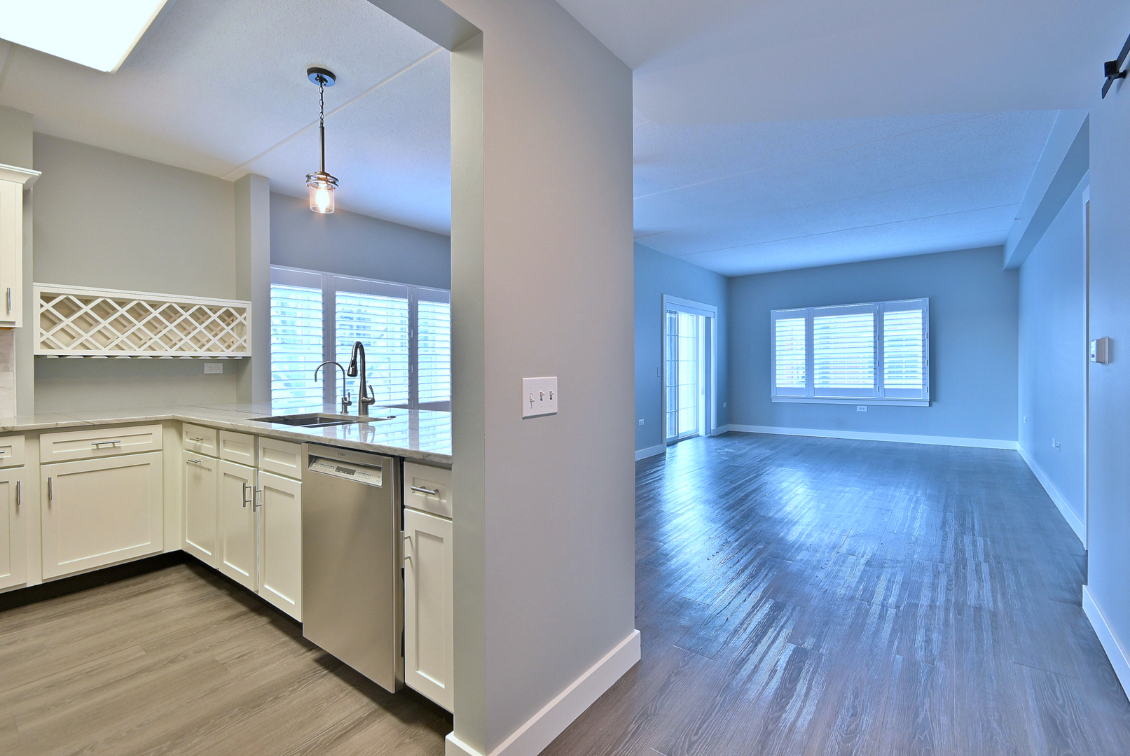 210 North Addison Avenue, Unit 303 Elmhurst, IL 60126 - Photo 3 of 20 a view of a kitchen and a dishwasher cabinets