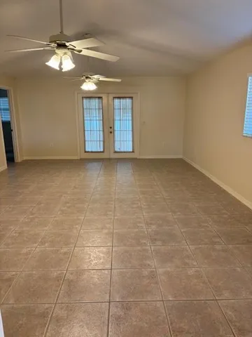 a view of an empty room with window