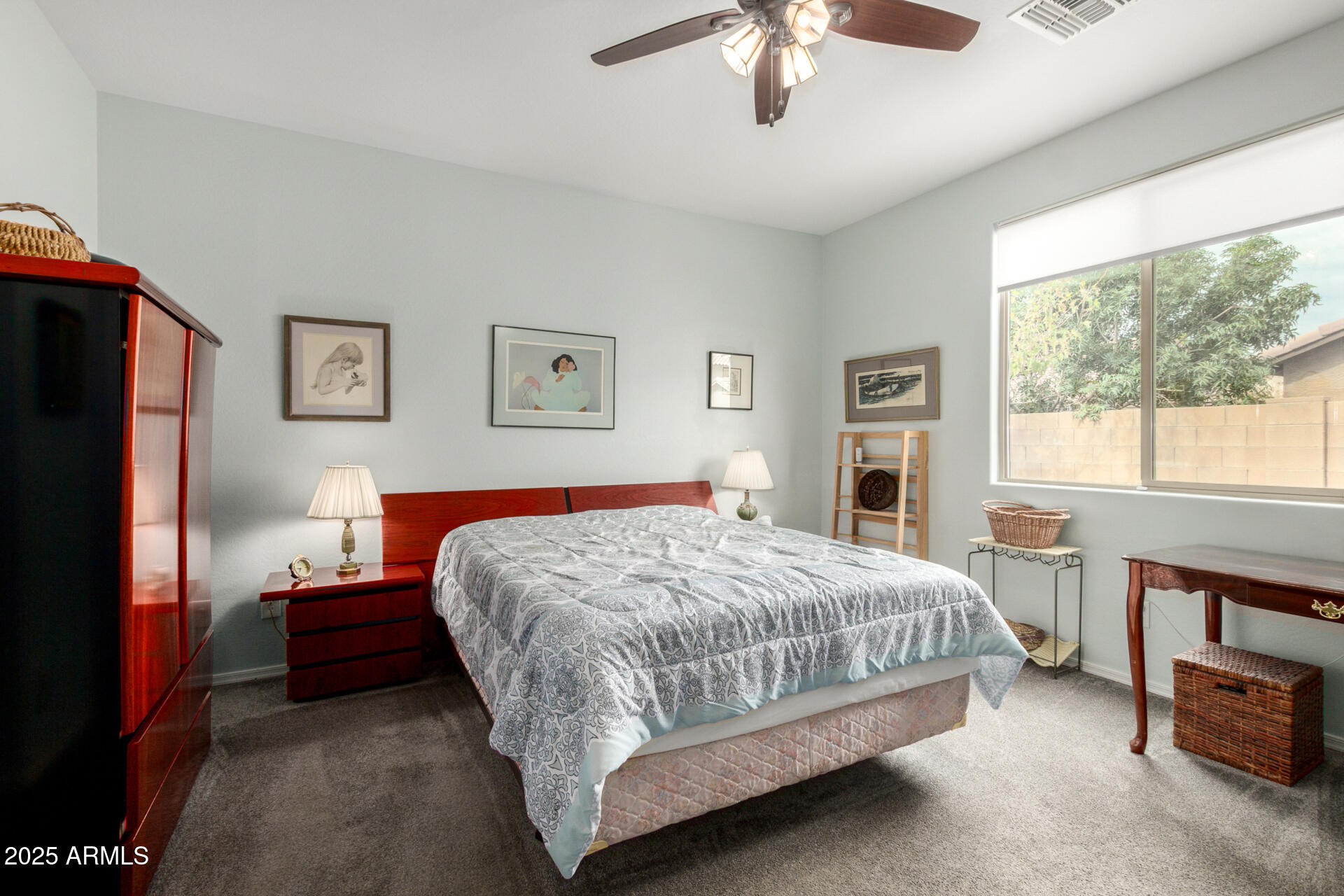 3440 North Mayfair Mesa, AZ 85213 - Photo 13 of 31 a bedroom with a bed and a chandelier