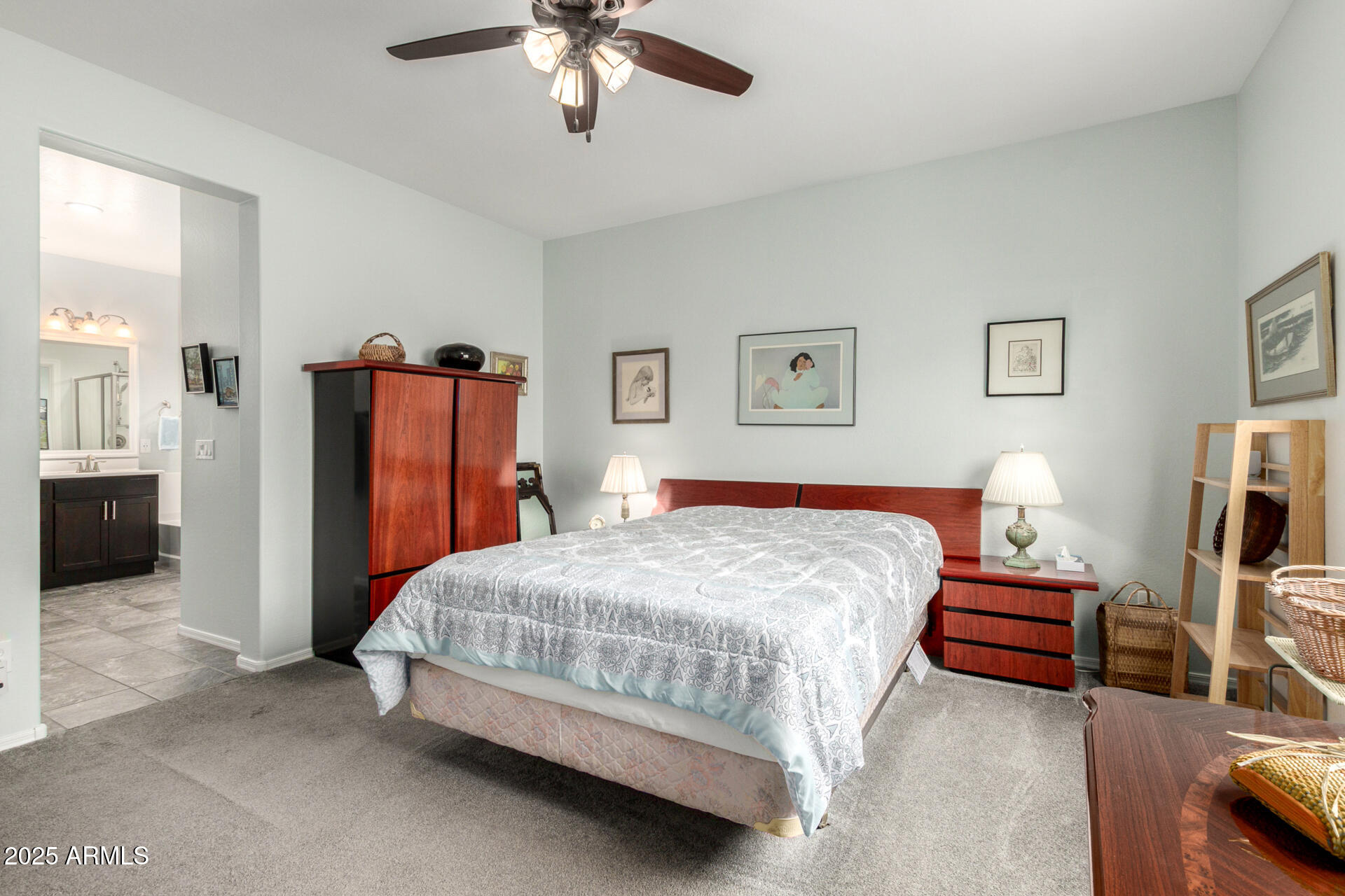 3440 North Mayfair Mesa, AZ 85213 - Photo 14 of 31 a bedroom with a bed and a chandelier