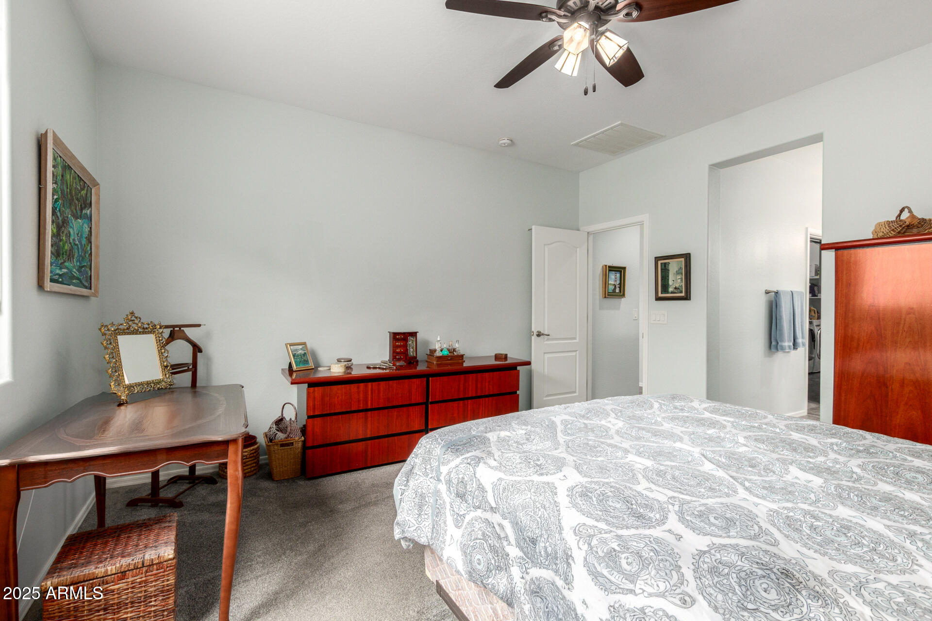 3440 North Mayfair Mesa, AZ 85213 - Photo 15 of 31 a bedroom with a bed and a chandelier