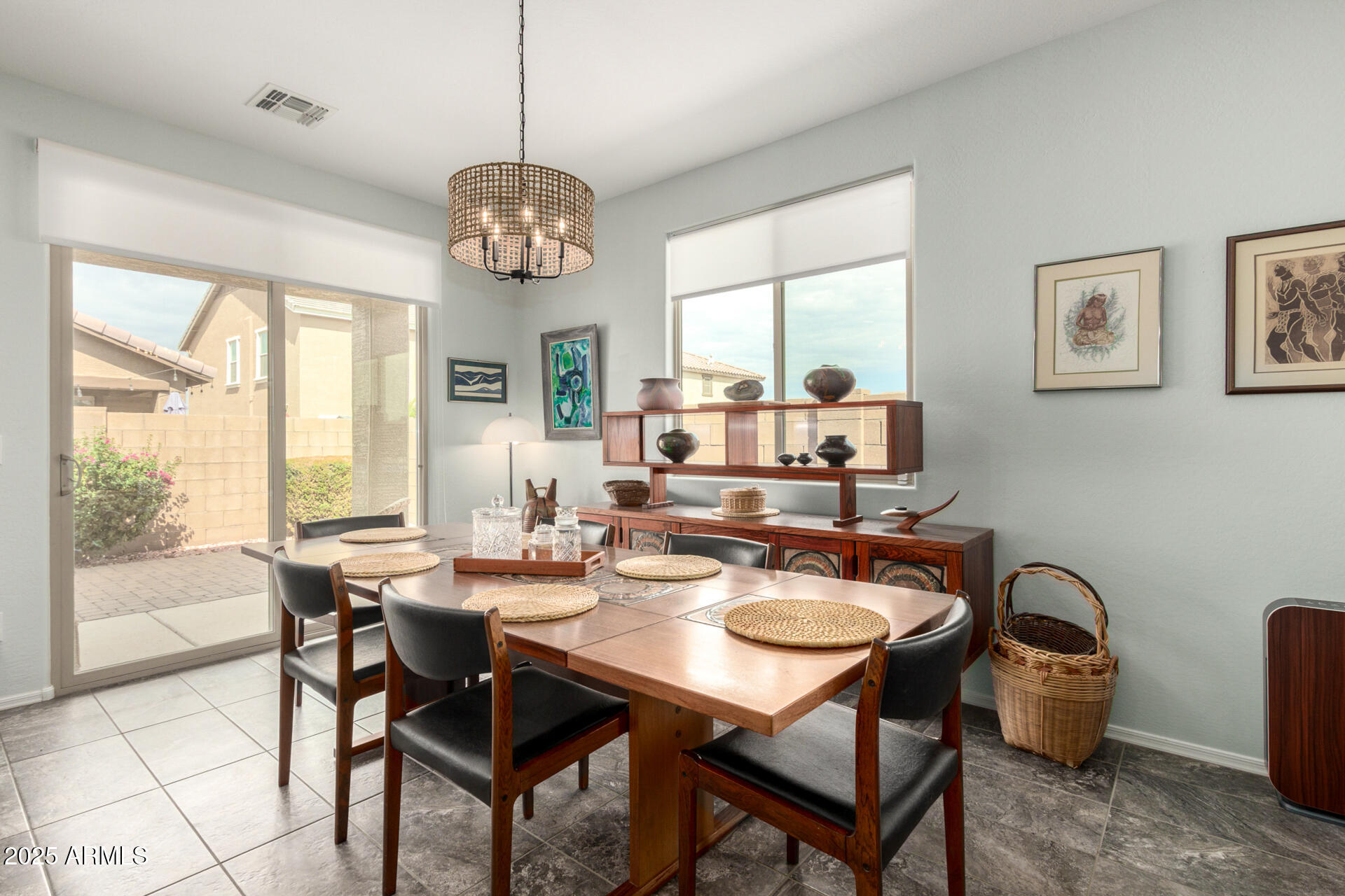 3440 North Mayfair Mesa, AZ 85213 - Photo 9 of 31 a dining room with furniture a chandelier and window