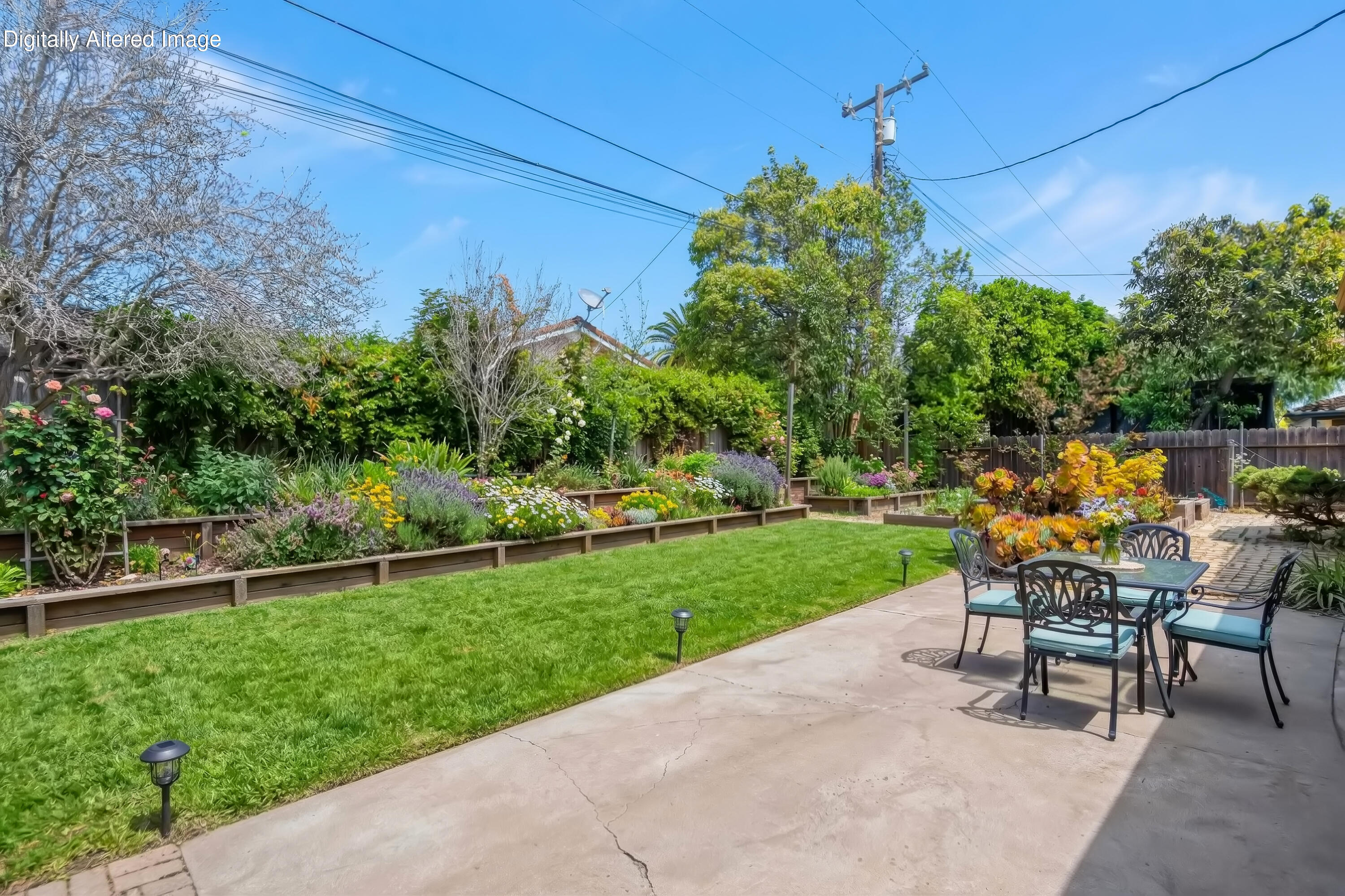 6242 Guava Avenue Goleta, CA 93117 - Photo 17 of 19 a table and chairs in the garden