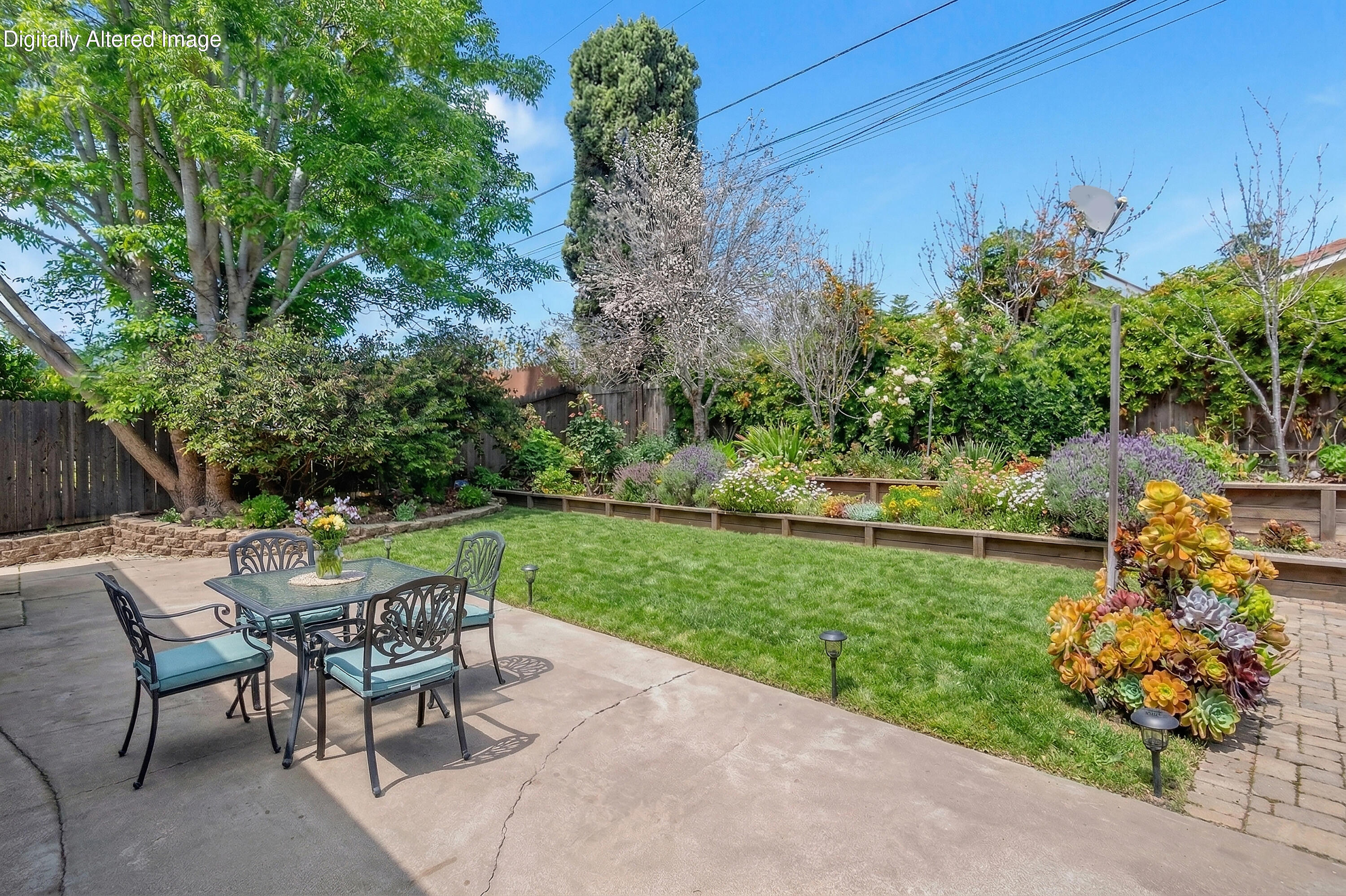 6242 Guava Avenue Goleta, CA 93117 - Photo 19 of 19 a view of a chair and table on the garden