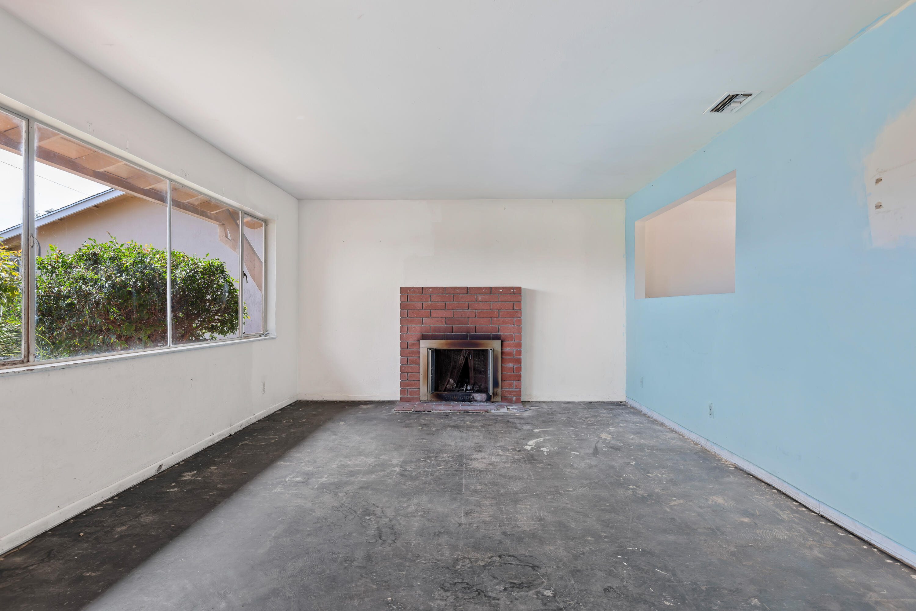 6242 Guava Avenue Goleta, CA 93117 - Photo 2 of 19 a view of empty room with a fireplace