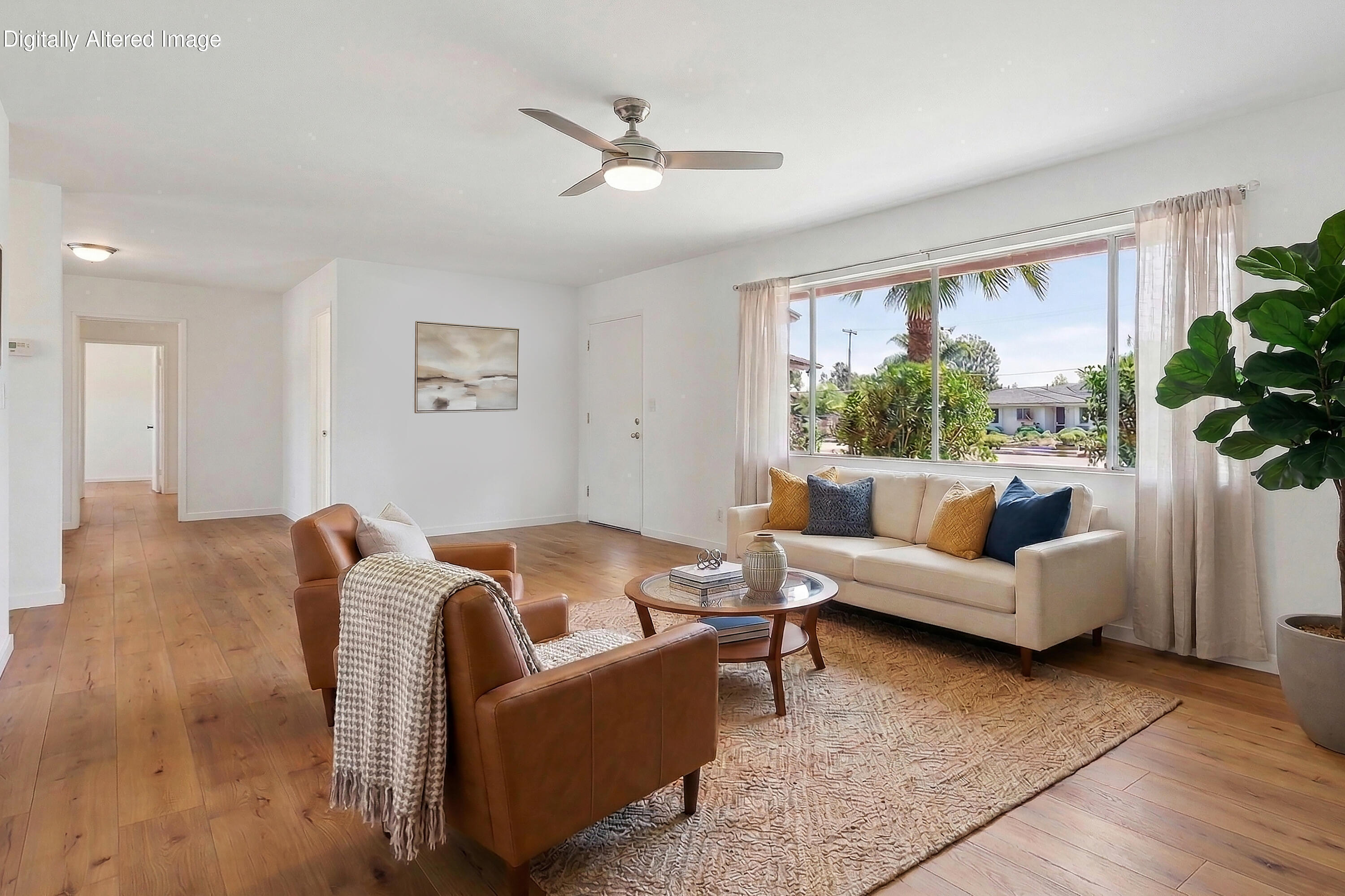 6242 Guava Avenue Goleta, CA 93117 - Photo 5 of 19 a living room with furniture and a large window