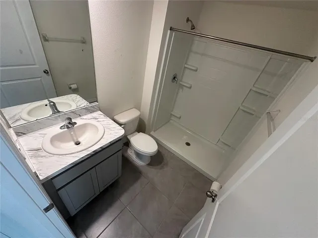 an entryway door with a hallway in the room